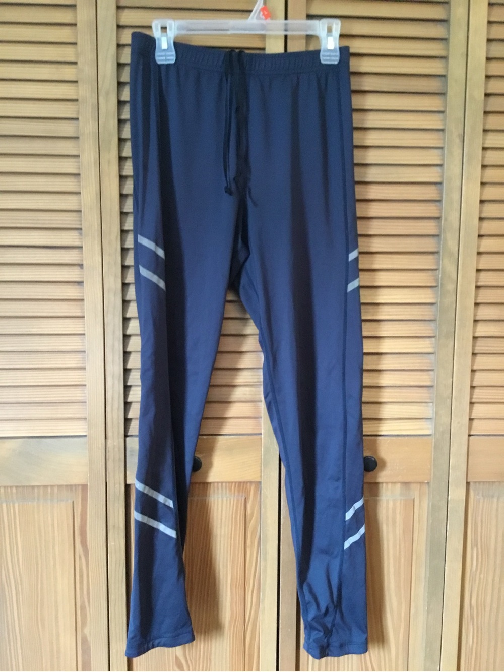 Saucony Navy Blue Men's Running Pants with Reflective Stripes